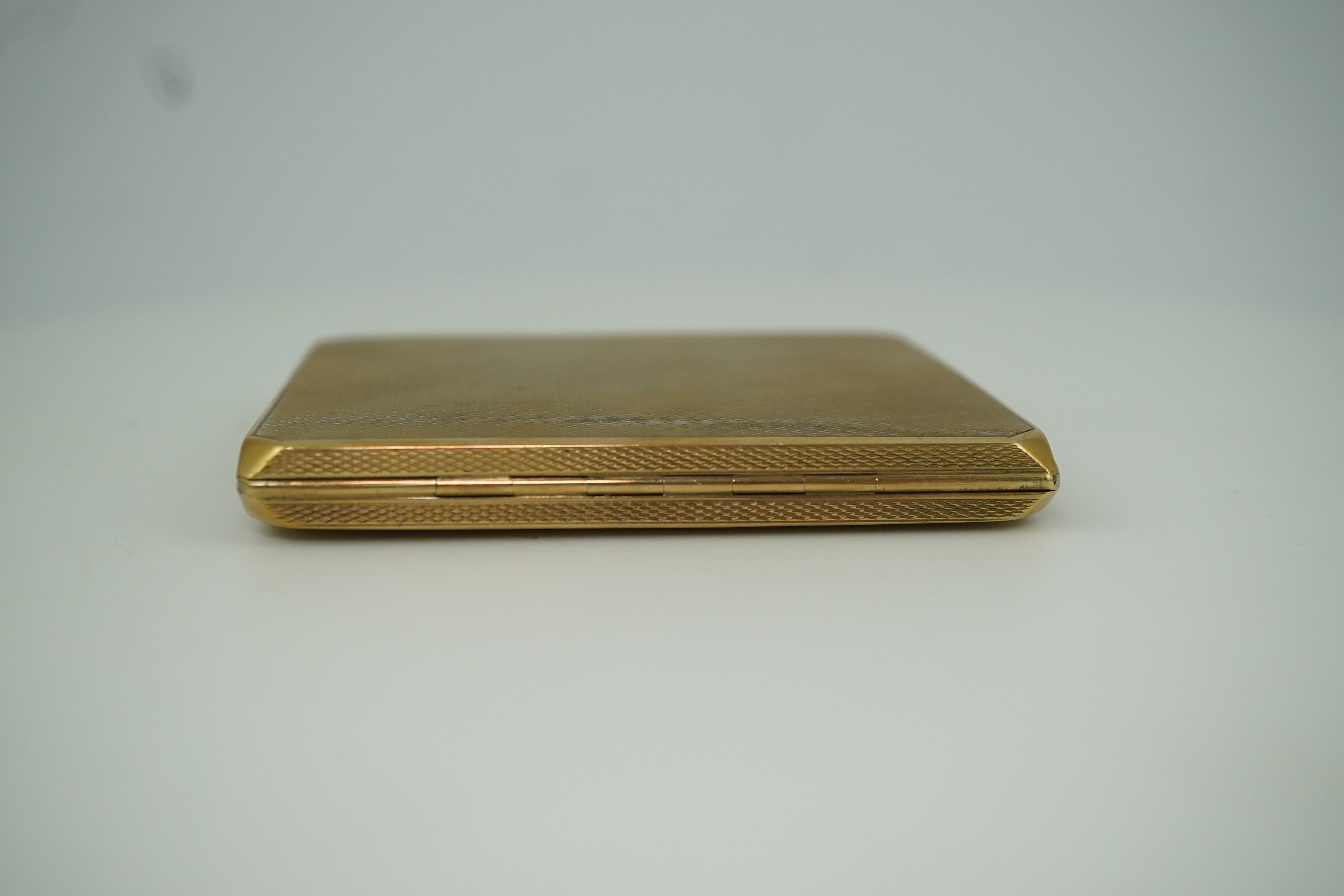 A 9ct gold cigarette case, circa 1930